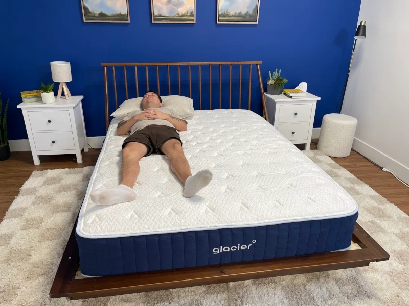Our tester back-sleeping on a Glacier Original Hybrid Mattress
