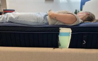 Full body back-sleeping edge support test of the DreamCloud Luxe Memory Foam Mattress