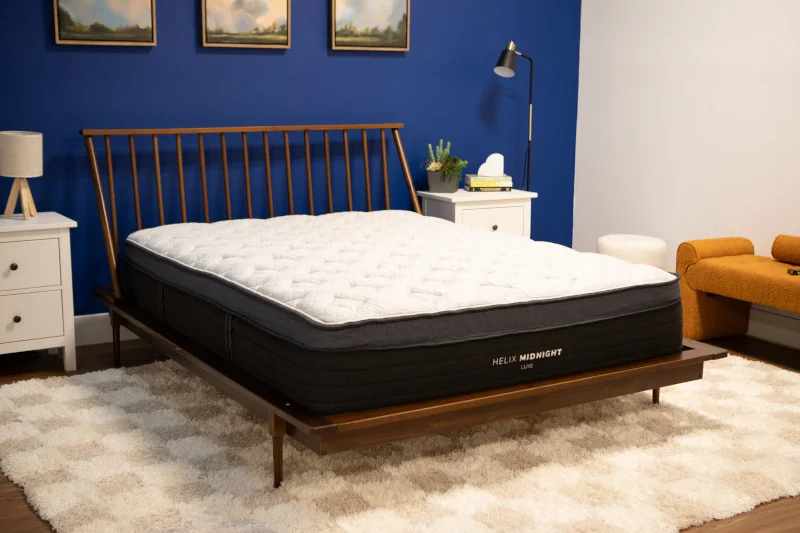 Full view of a Helix Midnight Luxe Mattress in the Sleepopolis studio