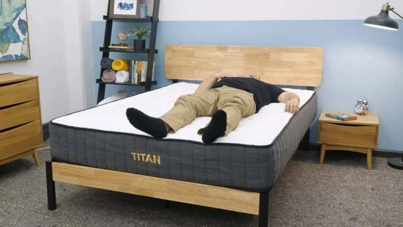 A person back sleeping on the Titan Plus mattress by Brooklyn Bedding