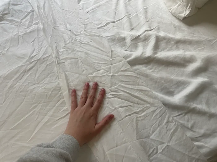 Our tester Riley Otis feels a Sijo Airy Weight Tencel Sheet.