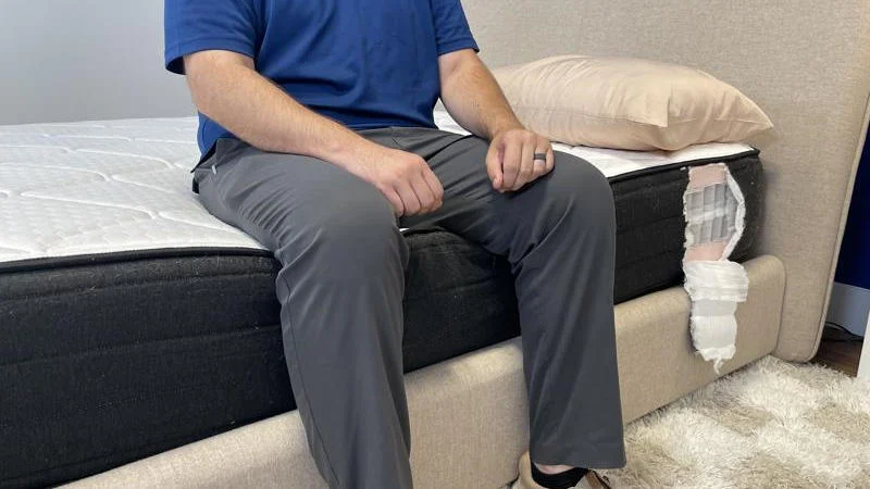 Seated edge support test on the Brooklyn Bedding Plank Firm Luxe Mattress