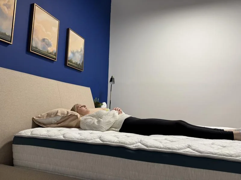 Our tester back-sleeping on the Helix Twilight Mattress