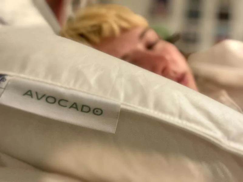 Our tester using an Avocado Down Pillow