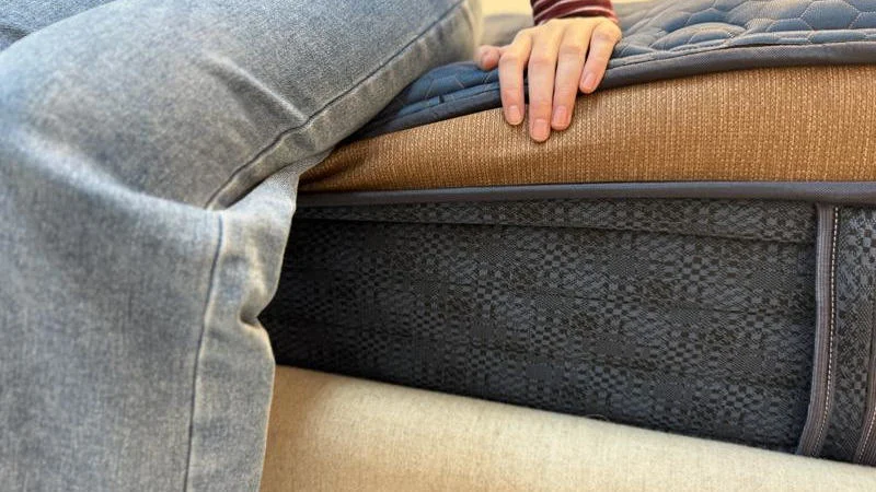 Seated edge support test on the Brooklyn Bedding Aurora Luxe mattress