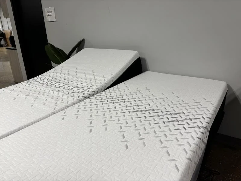 A Nectar Premier Adjustable Base with Split King mattresses with both halves adjusted slightly differently