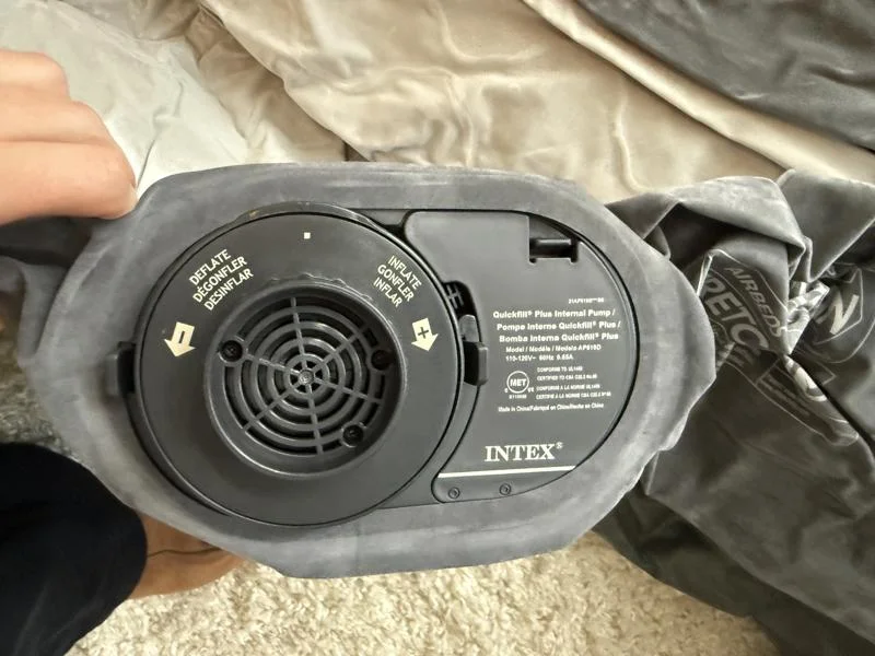 A close look at the air pump on the Intex Dura-Beam Ultra-Plush Inflatable Pillow Top Air Mattress