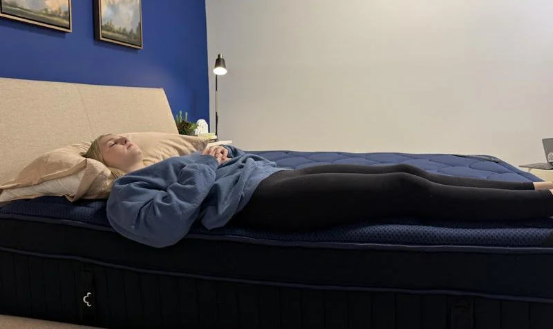 Back sleeping full body edge support test on the DreamCloud Ultra Hybrid Mattress