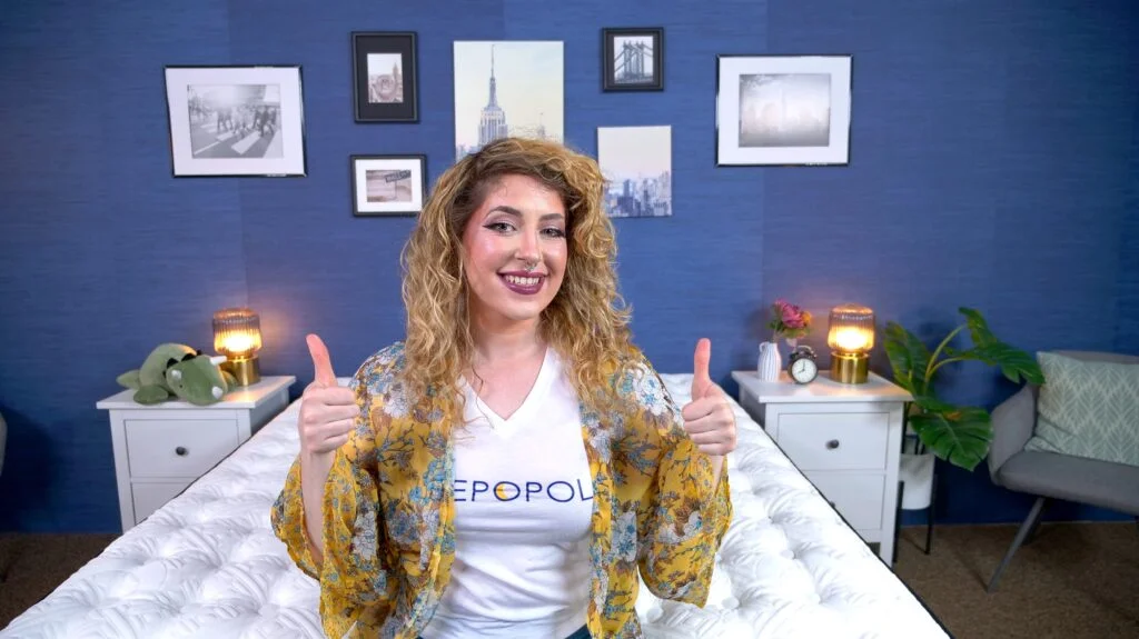 Nichole testing the Stearns & Foster Kirkland Signature Lakeridge Mattress