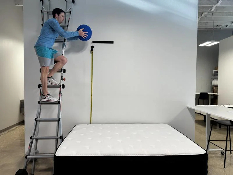 Our testers performing a bounce test on the Titan Plus Luxe