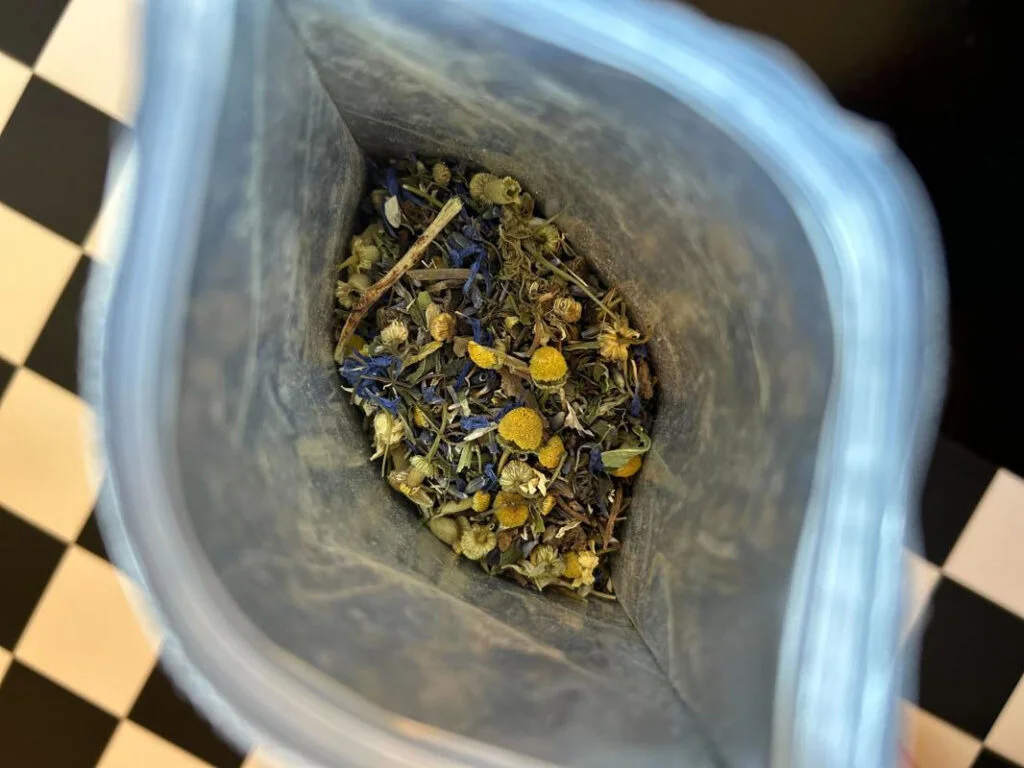 Looking into a bag of Adagio 40 Winks loose-leaf tea