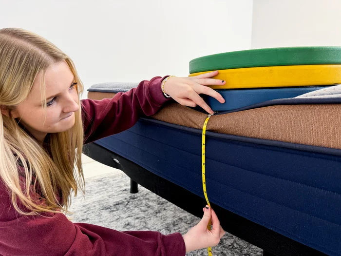 Testing edge support on a Brooklyn Bedding CopperFlex Mattress