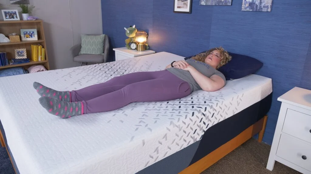 Nichole back sleeping on the Nectar Ultra mattress.