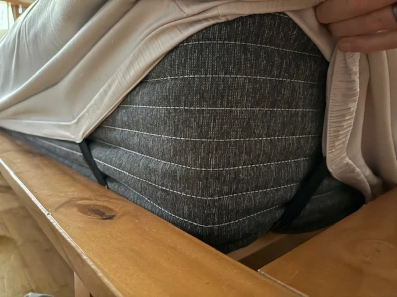 A LUXOME Luxury Sheet with a strapped down corner