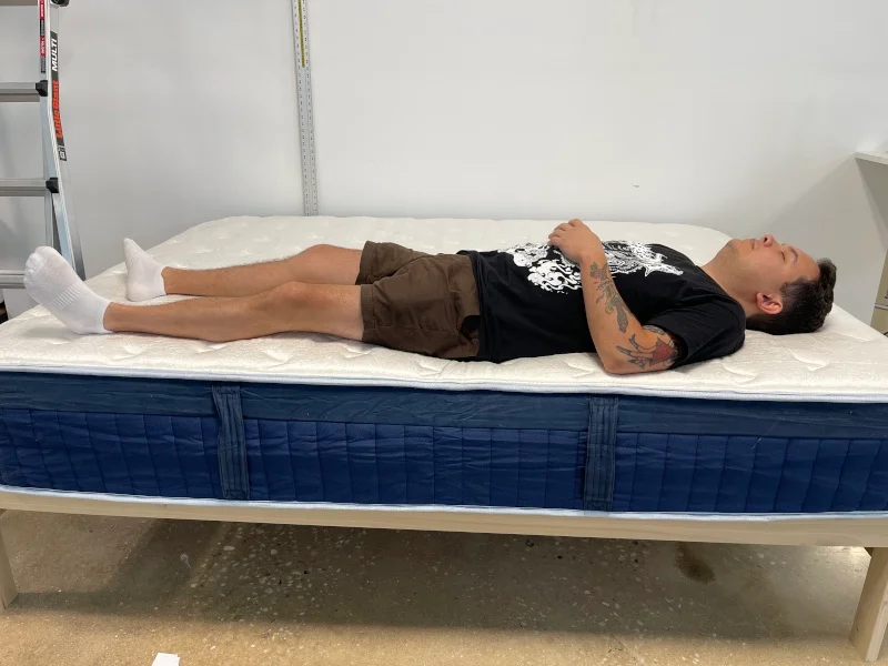Full body edge support test on a Glacier Summit Hybrid Mattress