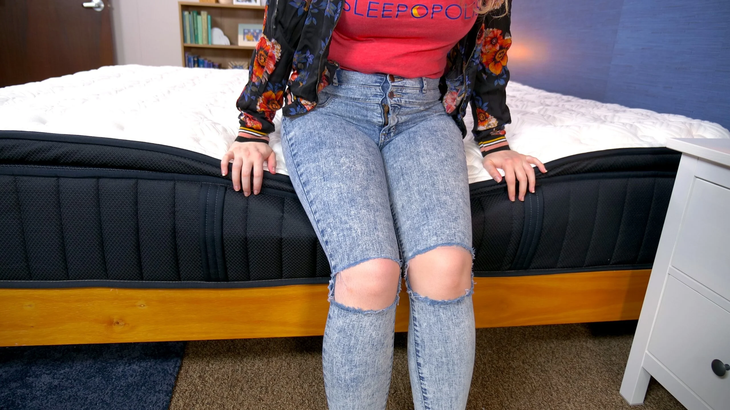 Nichole testing the edge support on the Stearns & Foster Kirkland Signature Lakeridge Mattress