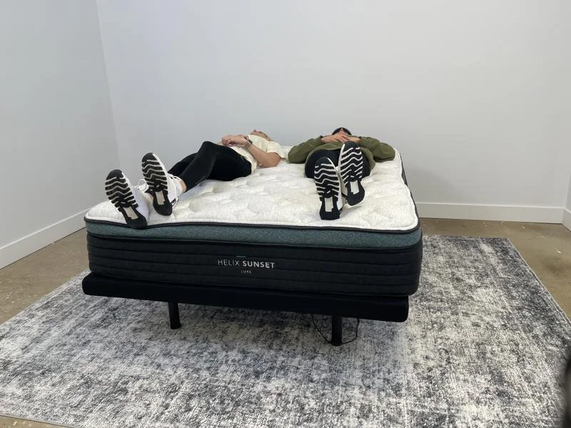 Our product testers partner up for motion isolation testing of the Helix Sunset Luxe Mattress.