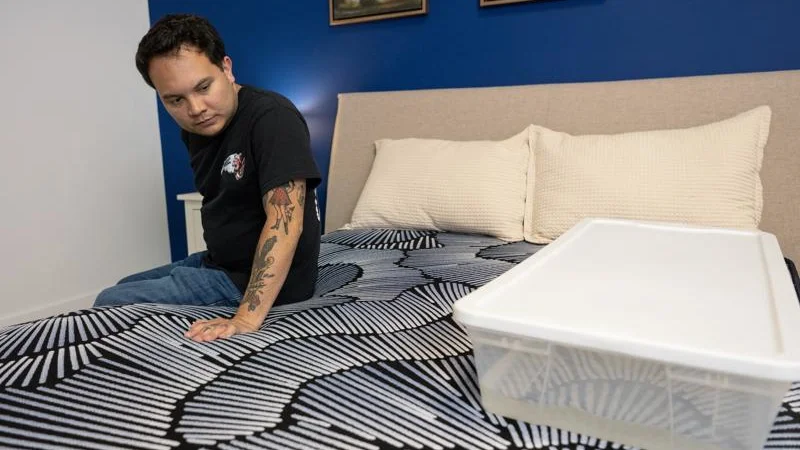 Our tester conducts a ripple test of motion isolation on the Serta Perfect Sleeper X Mattress