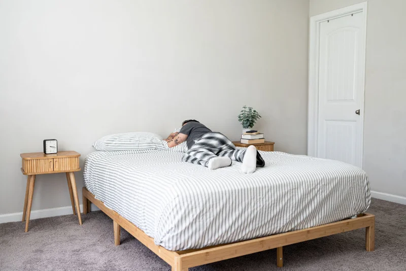 Brooklinen Luxe Sateen Sheets on a bed