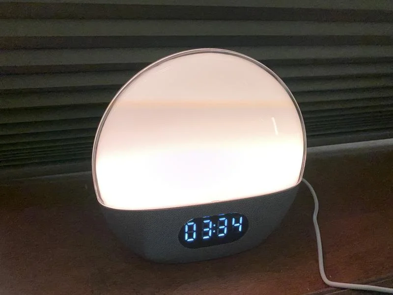 The WiiM Wake-Up Light glowing pink
