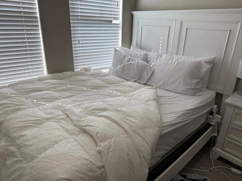 Boll & Branch Down Duvet Insert on a bed