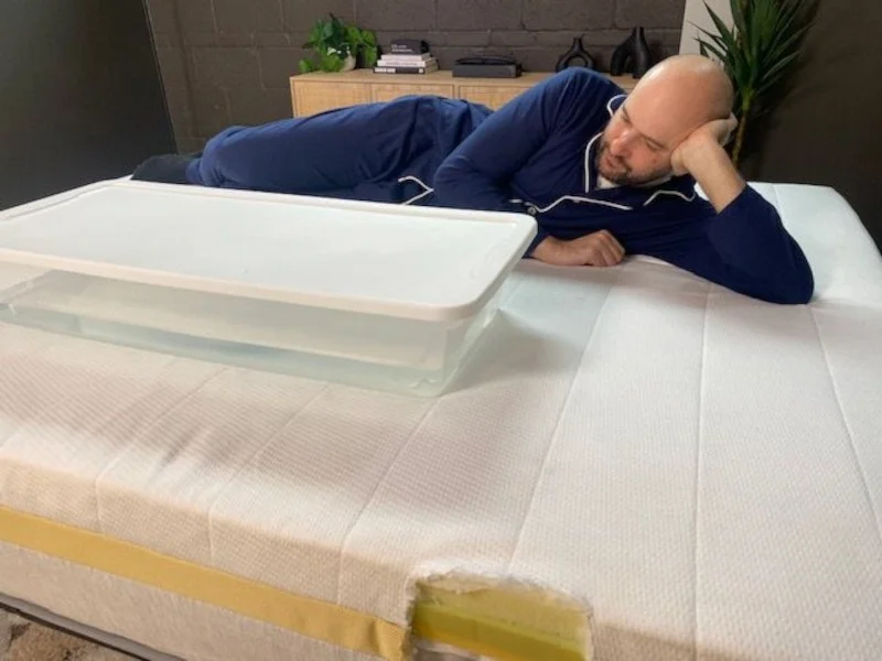 Our tester performs a ripple test on a Helix Dawn Mattress