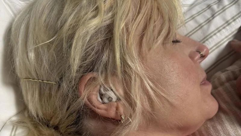 Our tester resting with a 2nd-gen pair of Ozlo Sleepbuds