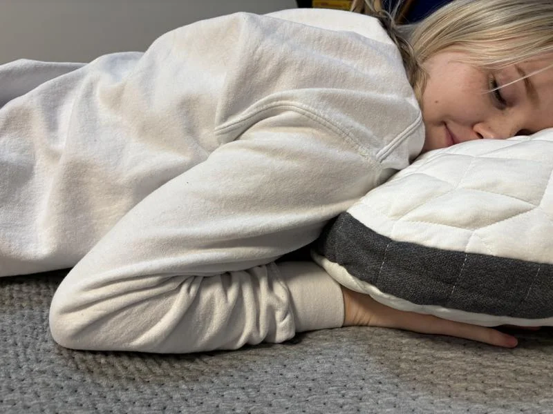 Riley Otis stomach sleeping with a Cariloha Resort Pillow