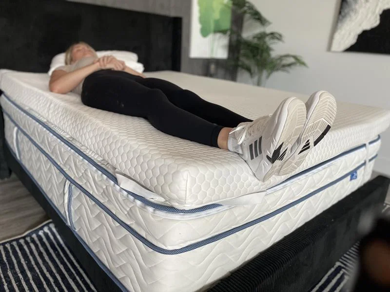 Our tester resting on a Helix GlacioTex Premium Topper