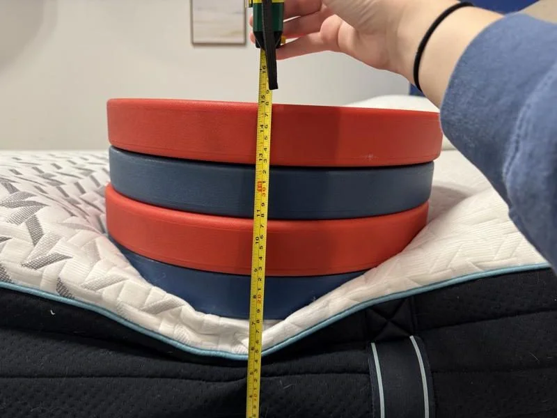 Measuring weight plates on the Nectar Premier Hybrid Mattress