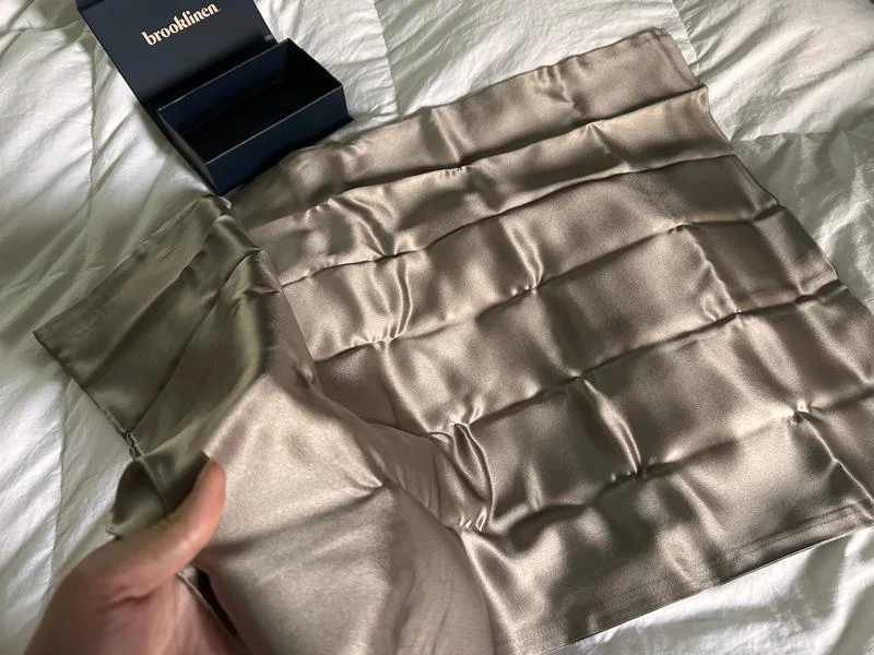 Unfolding a new Brooklinen Mulberry Silk Pillowcase