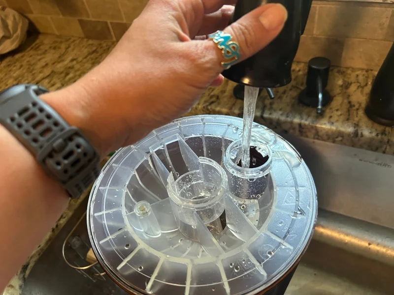 Our tester fills the reservoir on a Vernado Lucerna Humidifier.