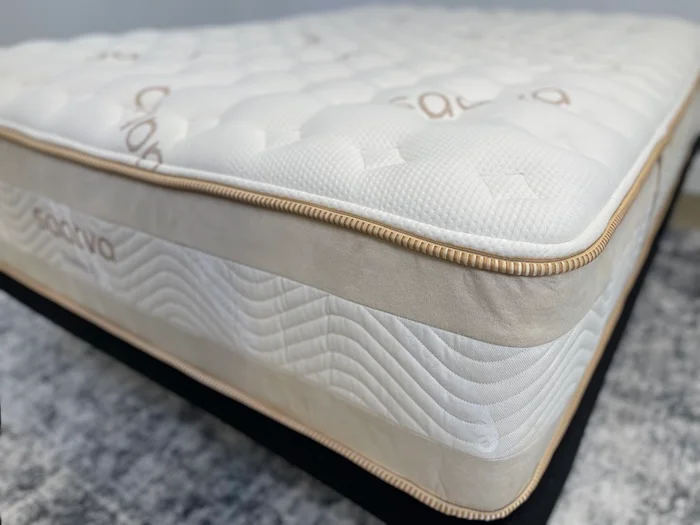 A closeup of one corner of the Saatva Rx mattress.