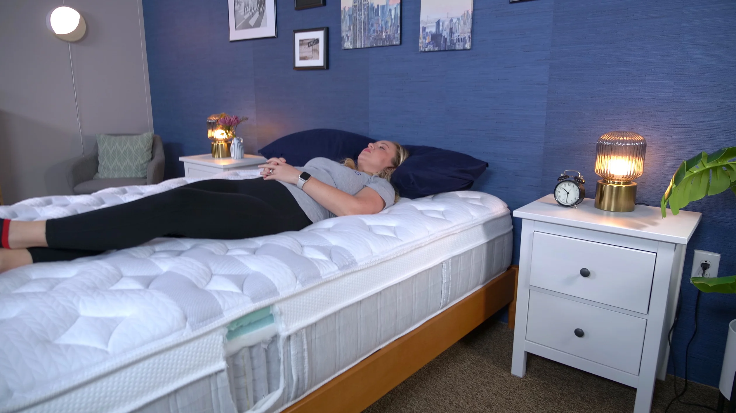 A person back-sleeping on the Leesa Sapira Chill mattress