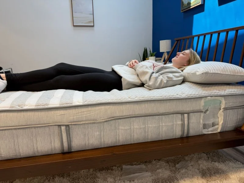 Our tester back sleeping on a Leesa Plus Hybrid Mattress