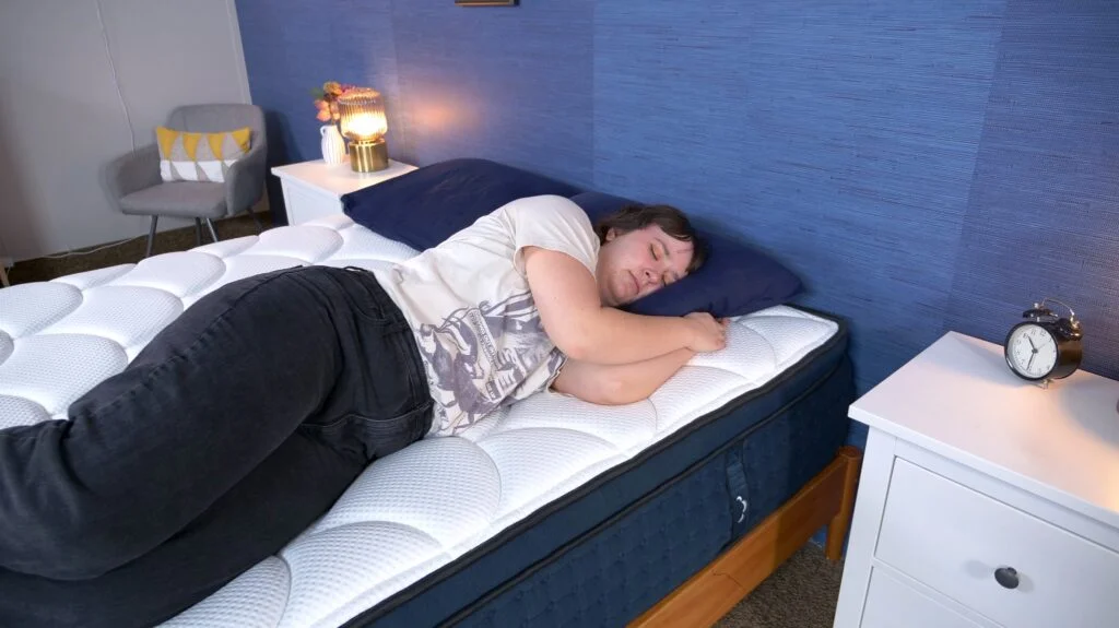 Amelia testing side sleeping for DreamCloud Premier Rest